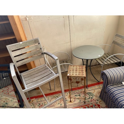 47 - A patio table, two chairs, a high patio chair and a gold sprayed metal stand