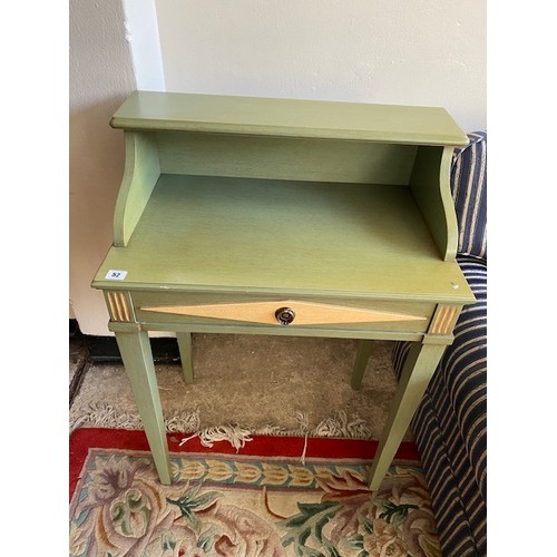 52 - An Italian green painted writing table fitted drawer on square legs - 25in. wide