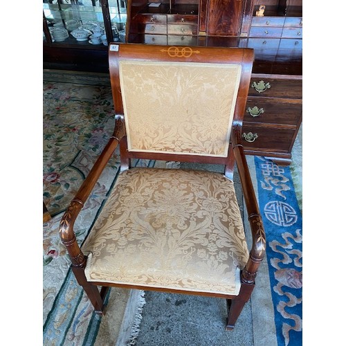 67 - A Continental carver chair with inlaid decoration of three rings to the cresting rail, stuff over se... 