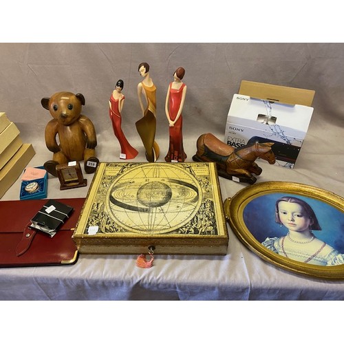 353 - An Indonesian wood bear, three resin figures of Art Deco style ladies, an oval Italian oval tray, Go... 