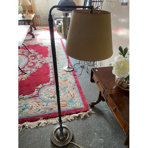 56 - A grey sprayed floor standing lamp with Corinthian column, on circular base