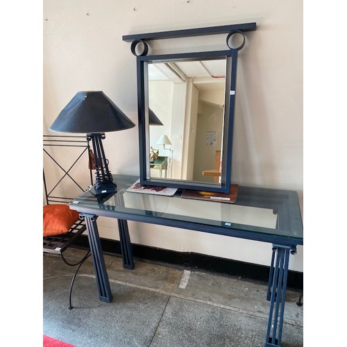 61 - A modern blue sprayed metal console table with glass top - 48in. wide, a matching tablelamp and mirr... 