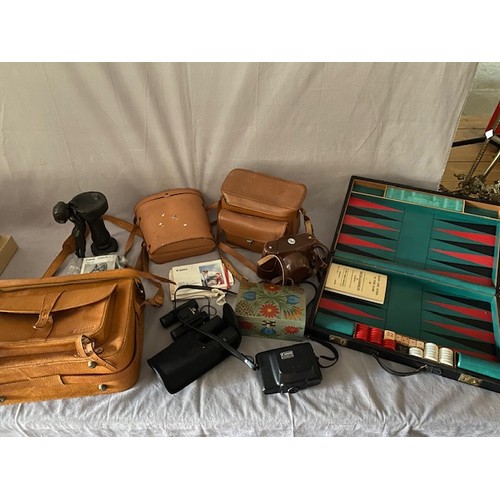 320 - A selection of binoculars, cameras, travelling cups, a backgammon set in black lacquered case etc..