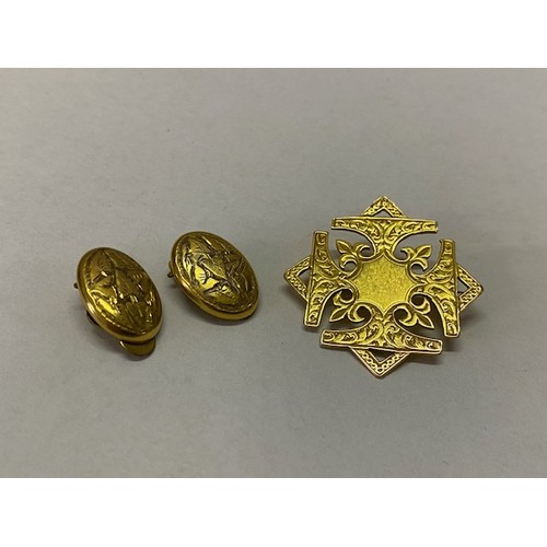 169 - A Victorian 9ct. gold brooch and a pair of gold coloured metal cufflinks converted to clip earrings