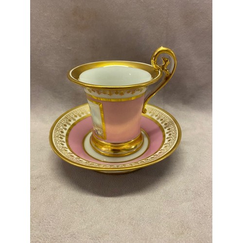 111 - A Sevres porcelain cabinet cup and saucer, the cup with gilt scroll handle, white and gilt rim, pink... 