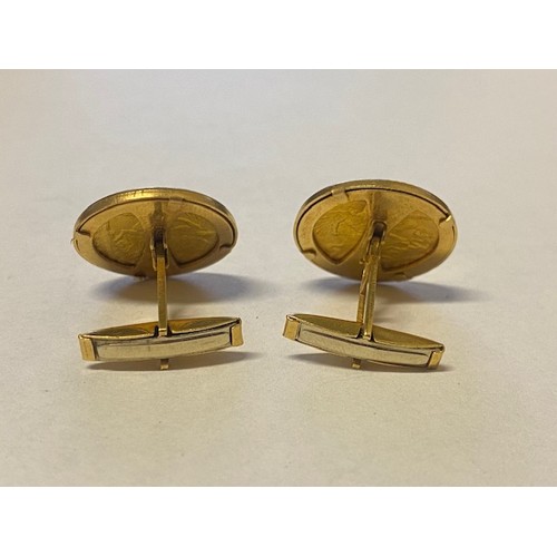 197 - A pair of Victorian gold half sovereign cufflinks mounted in 18ct. gold