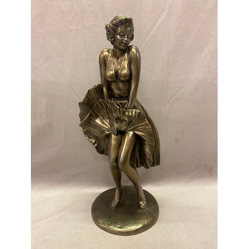 250 - A silvered resin model of Marilyn Monroe - 16 3/4in. high