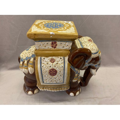 87 - A pottery elephant form vase stand