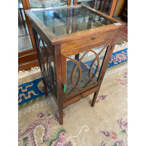 48 - A Georgian design mahogany bijouterie cabinet with hinged glass lid, glass door and sides, on square... 