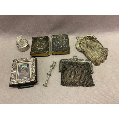 159 - Two miniature Common Prayer books with repousse decorated silver fronts, two silver coloured metal m... 