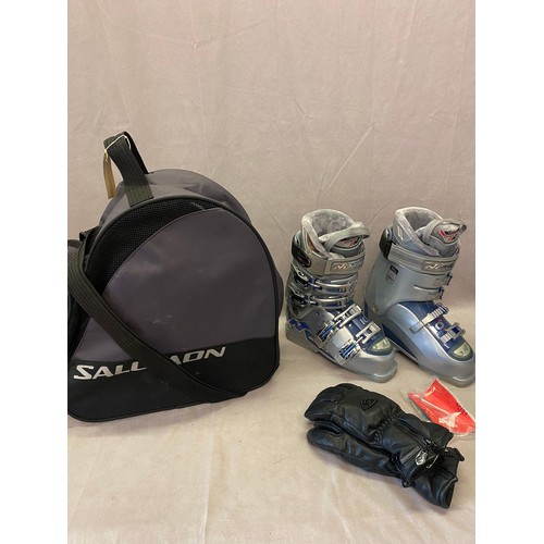 65 - A pair of lady's Nordica ski boots, Killy ski jacket and salopettes size 12