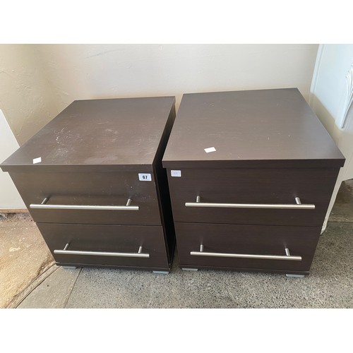 67 - A pair of dark wood finished bedside chests, each fitted two drawers - 16in. wide