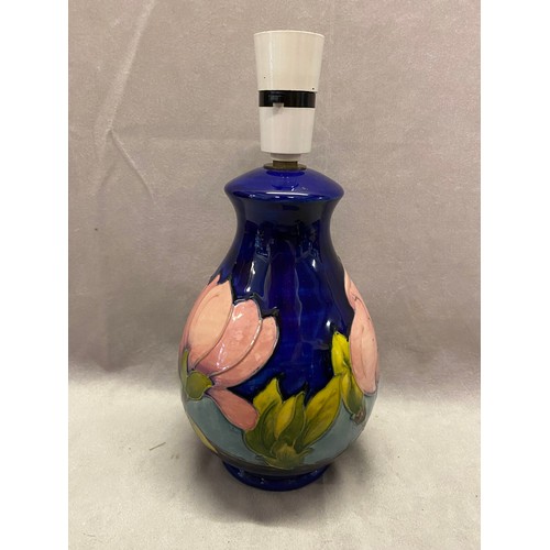 103 - A Moorcroft tablelamp base of baluster form, blue decorated magnolia - 8in. high