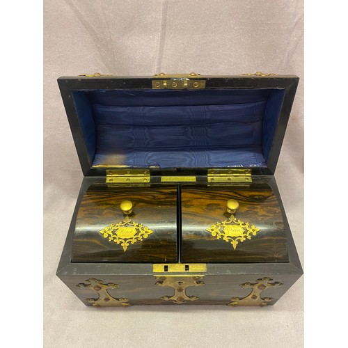 306 - A Victorian coromandel wood and brass bound tea caddy with dome shaped top, the interior fitted two ... 