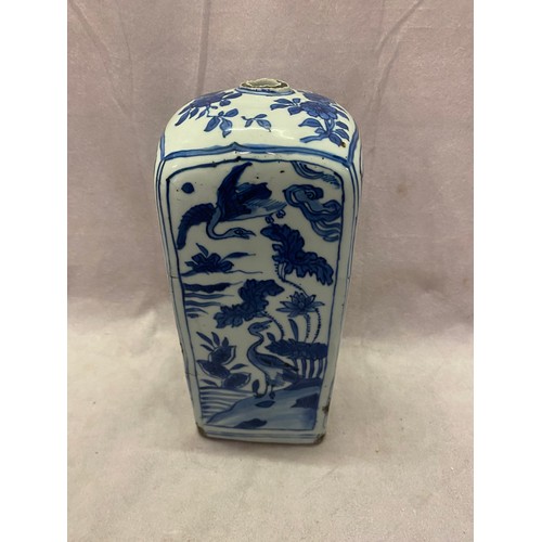 119 - A Chinese 18th Century vase of square form decorated in blue and white with Ho Ho birds and flowers ... 