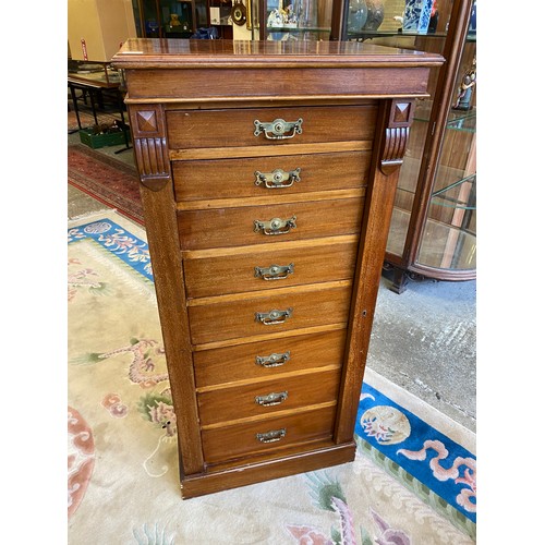 63 - A 19th Century mahogany Wellington chest fitted eight graduated drawers, on platform base - 24in. wi... 