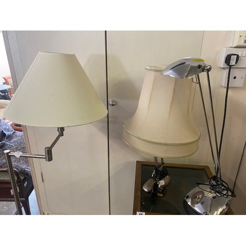 56 - A brushed chrome adjustable floor standing lamp with shade, a chrome finished desk lamp and a brushe... 