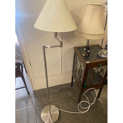 56 - A brushed chrome adjustable floor standing lamp with shade, a chrome finished desk lamp and a brushe... 