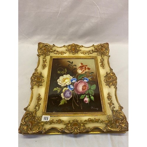 123 - A signed porcelain panel painted still life of flowers, in cream and gilt frame - 12in. x 9in.