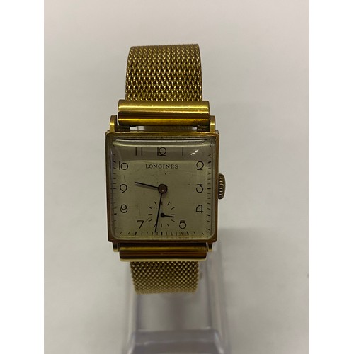 189 - A gentleman's Longines wristwatch with square dial, in an 18kt. gold case, on an 18kt. gold mesh bra... 