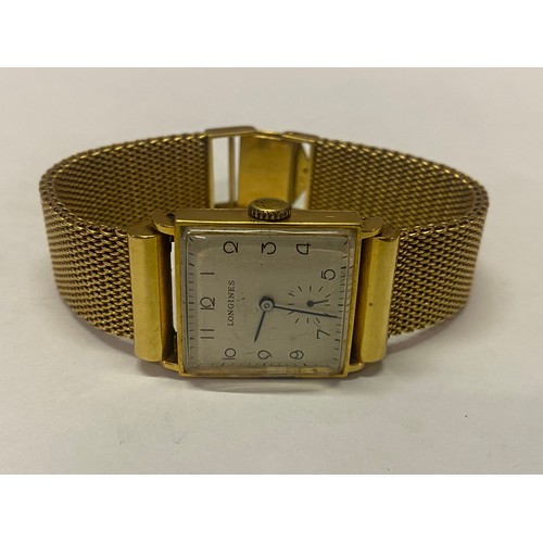 189 - A gentleman's Longines wristwatch with square dial, in an 18kt. gold case, on an 18kt. gold mesh bra... 