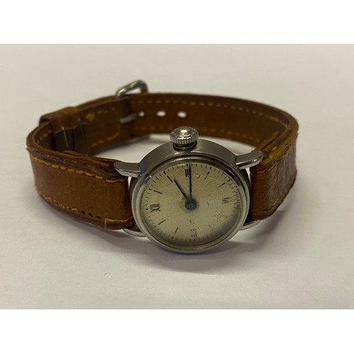 185 - A 1940's Rolex wristwatch with circular dial, Oyster Patent button, in a stainless steel case, on a ... 