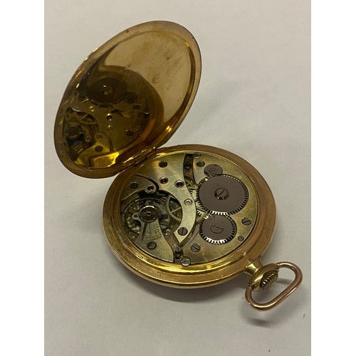 191 - An openface pocket watch with seconds dial, in a 9ct. gold case with engraved monogram to the back, ... 