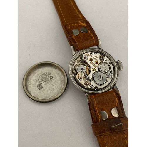 185 - A 1940's Rolex wristwatch with circular dial, Oyster Patent button, in a stainless steel case, on a ... 