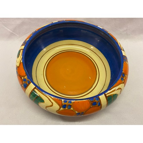 131 - A Clarice Cliff Fantasque large inverted fruit bowl decorated Sunrise pattern no.1929 - 10in. dia.