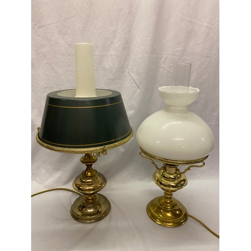 32 - Two brass tablelamp bases in the form of oil lamps, one with green metal shade, the other white opaq... 