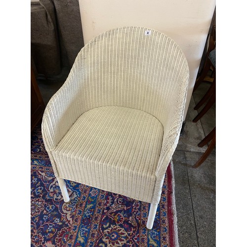 64 - A Lloyd Loom white sprayed bedroom chair