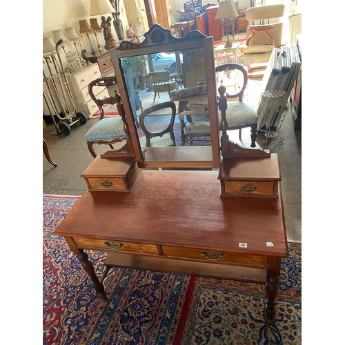 69 - An Edwardian mahogany dressing table fitted swing mirror and two jewel drawers, the base fitted two ... 