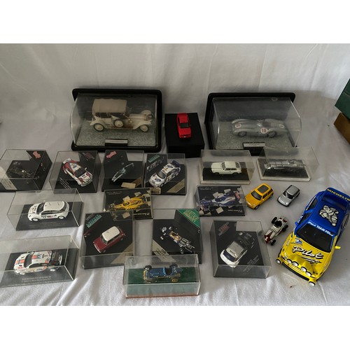 267 - A selection of model racing cars including BMW M3, Ford Focus WRC, Ford Escort WRC, Lotus 720, many ... 