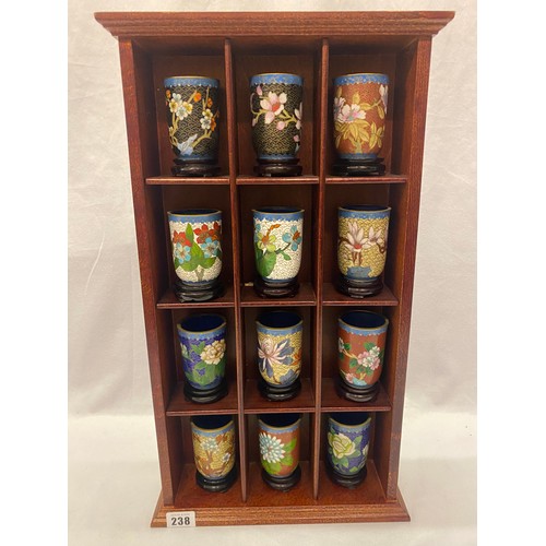 238 - Twelve miniature Cloisonne vases in fitted mahogany finished display shelf