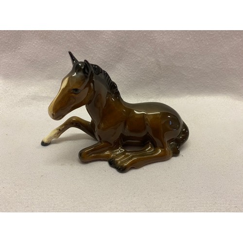 158 - Beswick models comprising:- black horse, brown horse, appalosso, stag, three foals and seated fox