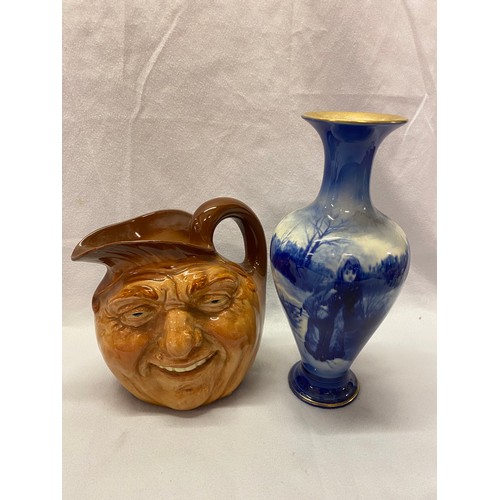 168 - A Royal Doulton large character jug - John Barleycorn and a Royal Doulton flow blue vase decorated f... 