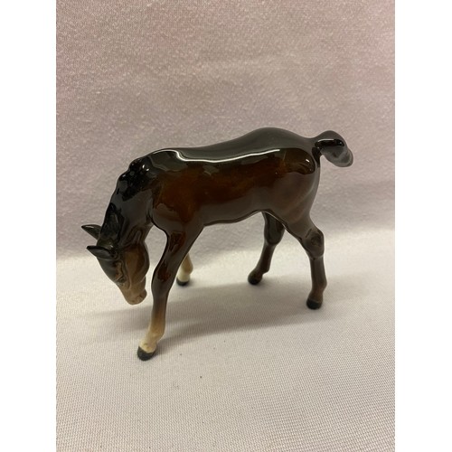 158 - Beswick models comprising:- black horse, brown horse, appalosso, stag, three foals and seated fox