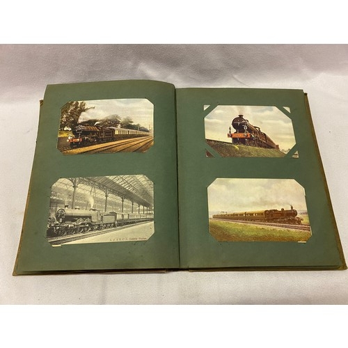 33 - An album containing a selection of early 20th Century postcards of steam trains