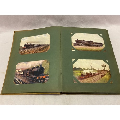 33 - An album containing a selection of early 20th Century postcards of steam trains