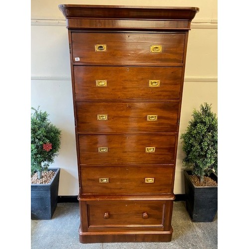 91 - A Victorian mahogany cabinet fitted five graduated drawers with recessed brass handles, enclosed by ... 