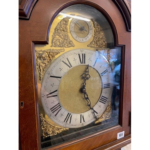 131 - An Edwardian longcase clock with brass dial, silvered chapter ring, chime/silent dial, striking move... 