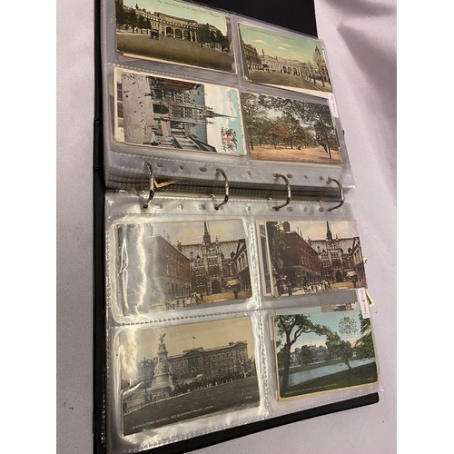 31 - A black folder containing a large selection of early 20th Century coloured and black and white postc... 