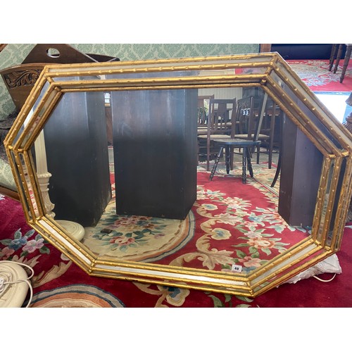 40 - A modern Italian octagonal wall mirror in a mirrored frame - 30in. x 42in