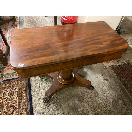 60 - A 19th Century mahogany card table with 'D' shaped folding top, on turned column with wrythen collar... 