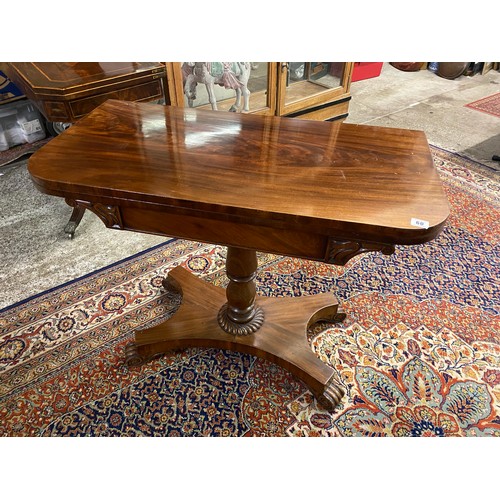 61 - A 19th Century mahogany card table with 'D' shaped folding top, tapering panelled column, on quatref... 