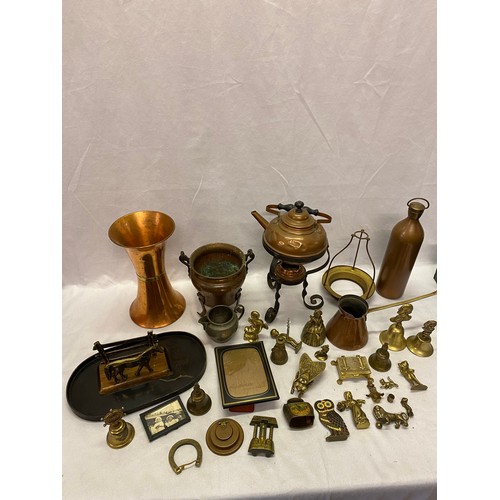 265 - A selection of copper and brass including jardiniere, vase, measure, kettle, small brass bells etc..