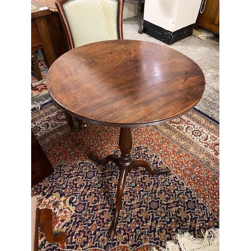 80 - A mahogany occasional table with circular top, on baluster turned column and three downswept legs