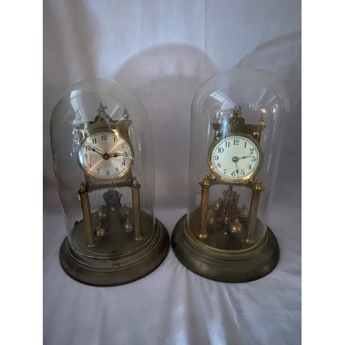 251 - Two 400 day clocks under glass domes