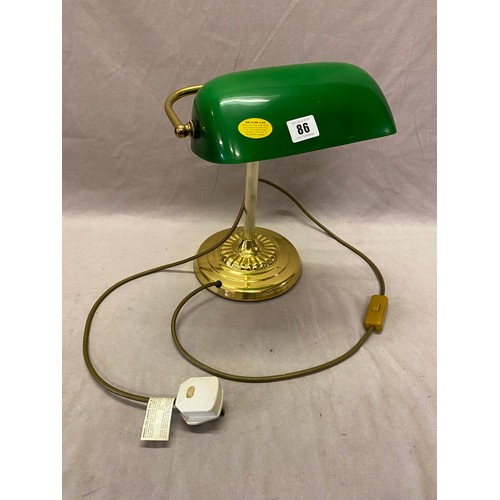 86 - A modern brass finished desk lamp with green glass shade