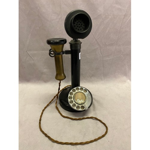 254 - A black bakelite stick telephone